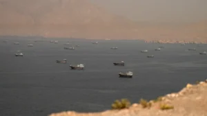 Military forces operate near the Strait of Hormuz during escalating tensions between the United States and Iran.
