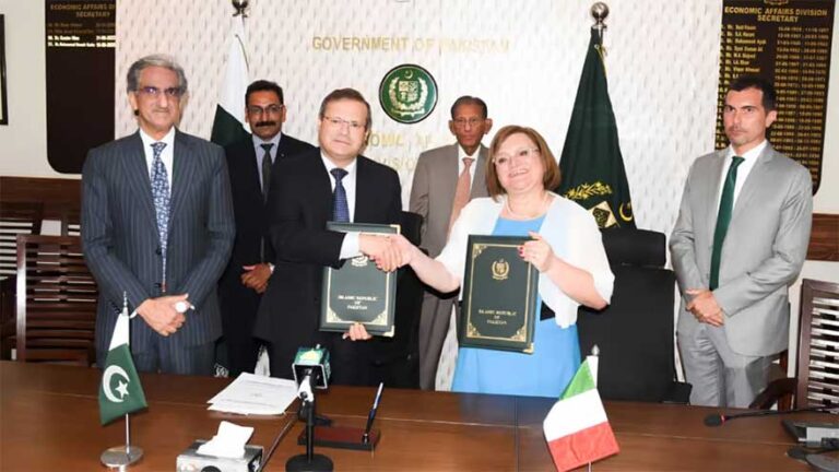 Officials from Pakistan and Italy attend the signing ceremony for the agricultural development agreement.