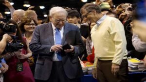Warren Buffett attends an event amid reports of a delayed Gates Foundation donation.