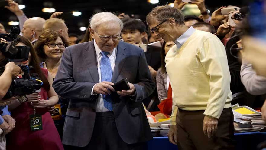 Warren Buffett attends an event amid reports of a delayed Gates Foundation donation.
