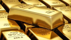 Gold bars and jewellery displayed following a decline in Pakistan’s gold prices.
