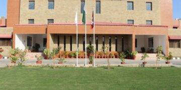International diplomats and Pakistani academics speaking at DHA Suffa University seminar on Middle East crisis and Pakistan’s diplomatic role.