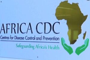 Africa CDC headquarters with officials reviewing pandemic funding and accreditation documents in Addis Ababa.