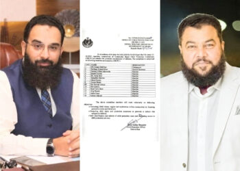 Government officials reviewing child protection committee documents in a formal Karachi meeting setting.