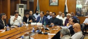 FPCCI officials addressing media on commercial importer taxation reforms in Karachi.