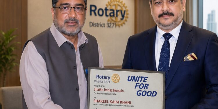 Rotary International District 3271 presenting Peace Award to Shaikh Imtiaz Hussain.
