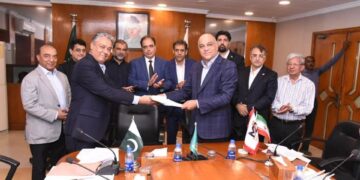 Pakistani and Iranian delegates signing LPG Pakistan MoU at Federation House Karachi to boost energy investment cooperation.