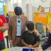Dr Fida Muhammad Bazai touring DigiTech Transformation digital skills facility in Sindh
