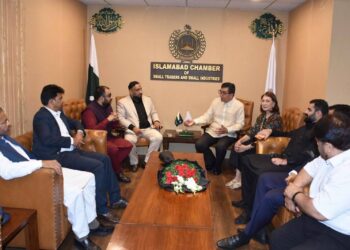 Ambassador Emmanuel R. Fernandez with ICSTSI members during the National Day ceremony in Islamabad.