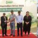 National Bank of Pakistan officials and participants planting saplings during an environmental sustainability initiative in Karachi.