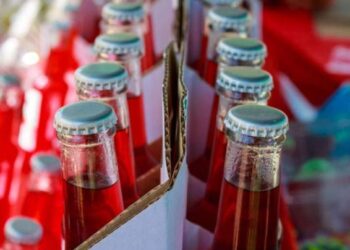 Punjab Food Authority officials inspect beverage production facility in Rawat over food safety violations.