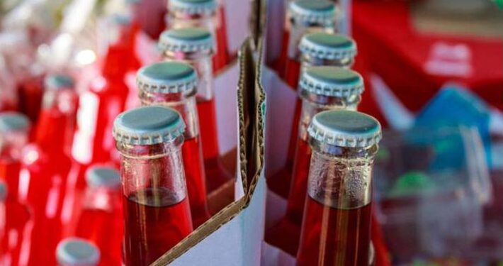 Punjab Food Authority officials inspect beverage production facility in Rawat over food safety violations.