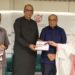 Dr Saira Bano presenting Whispers of Wellness during recognition ceremony.