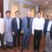Participants attending a Budget 2026 discussion session in Karachi with speakers addressing economic policy and fiscal planning at a Rotary Club event.