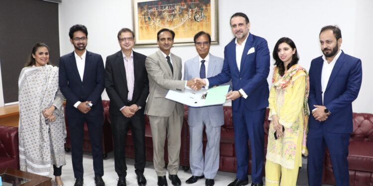 Officials from PEBS Hospital and KIRAN during the MoU signing ceremony in Karachi.