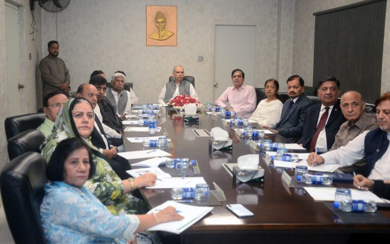 Federal Ombudsman Naveed Kamran Baloch chairs review meeting at Wafaqi Muhtasib Office in Karachi.