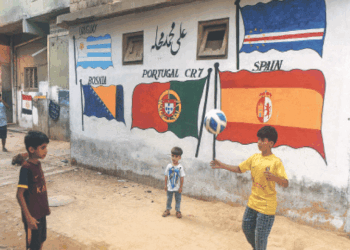 Football fans decorate Lyari streets ahead of the FIFA World Cup.
Photo File