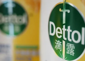 Dettol branding with Chinese social media reactions and advert controversy discussion on smartphone screen