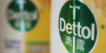 Dettol branding with Chinese social media reactions and advert controversy discussion on smartphone screen