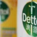 Dettol branding with Chinese social media reactions and advert controversy discussion on smartphone screen