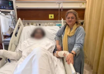 Hospital scene showing Dr Mahnoor Naseer receiving emergency medical care after acid attack in Quetta surgical ward.