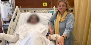 Hospital scene showing Dr Mahnoor Naseer receiving emergency medical care after acid attack in Quetta surgical ward.