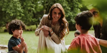 Catherine Princess of Wales speaking with children and educators during early childhood education visit in Reggio Emilia Italy.