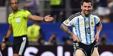 Lionel Messi in action after setting a new FIFA World Cup goals record.