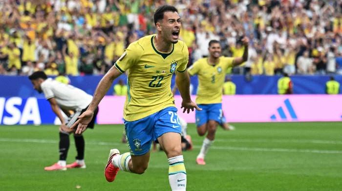 Brazil players celebrate after defeating Japan 2-1 in the FIFA World Cup 2026 Round of 32.