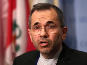 US-Iran deal signing ceremony in Switzerland with diplomats and national flags