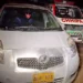 Police officers collecting evidence after a fatal shooting outside a residence in Orangi Town Karachi.