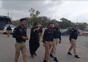 Security arrangements and mourners gathering for the 9th Muharram procession in Karachi.