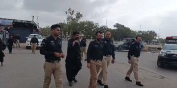 Security arrangements and mourners gathering for the 9th Muharram procession in Karachi.