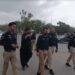 Security arrangements and mourners gathering for the 9th Muharram procession in Karachi.
