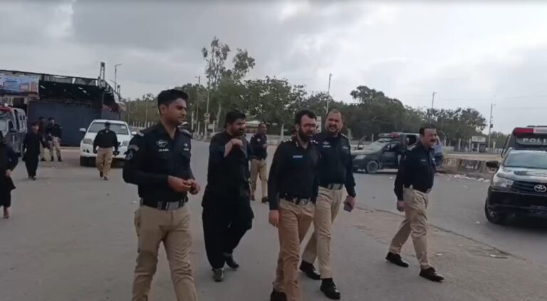 Security arrangements and mourners gathering for the 9th Muharram procession in Karachi.