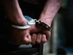 Recovered cocaine, mobile phones and a pistol seized by SIU police during operations in Karachi.
