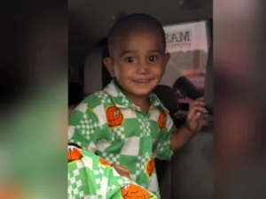 Police officers investigate after a two-year-old boy was allegedly abducted from a private housing society in Karachi's Manghopir area.