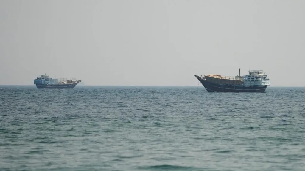 Oil tankers transiting the Strait of Hormuz amid escalating US-Iran military conflict.