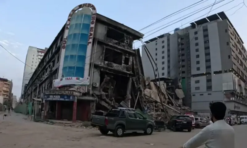 Gul Plaza building in Karachi following the committee's investigation into the deadly fire.