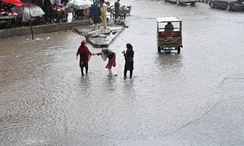 Chenab River flooding in Punjab as officials monitor water levels during Pakistan's monsoon season.
