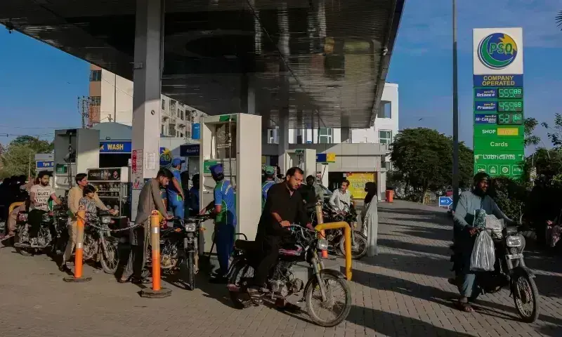 Fuel pumps at a petrol station as PTI and PPP react to the government's latest petroleum price hike in Pakistan.