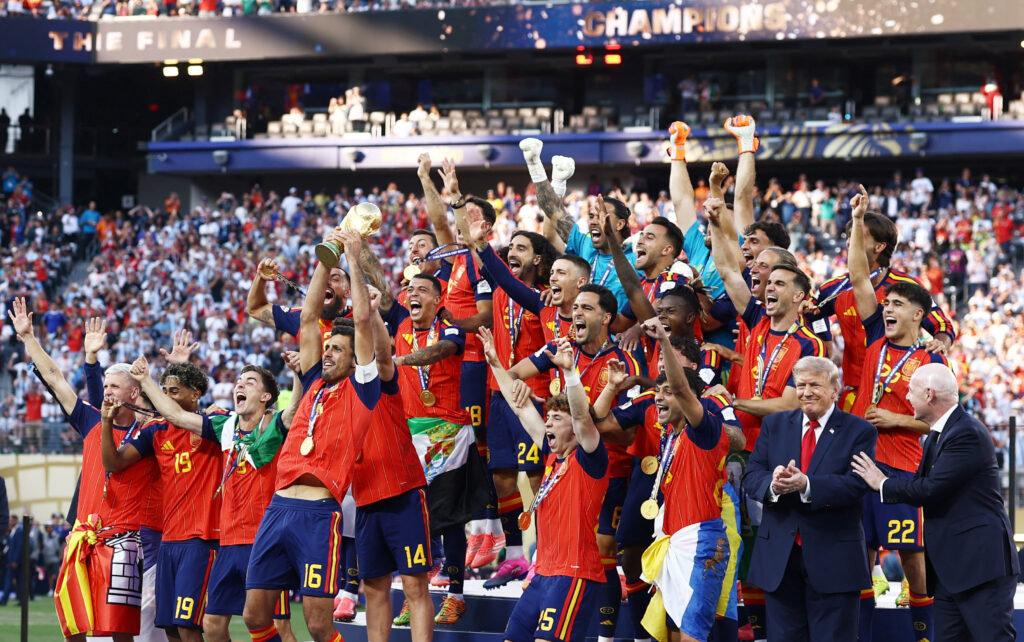 Spain players celebrate with the FIFA World Cup trophy after defeating Argentina 1-0 in the 2026 World Cup final at MetLife Stadium in New Jersey.