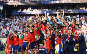 Spain players celebrate with the FIFA World Cup trophy after defeating Argentina 1-0 in the 2026 World Cup final at MetLife Stadium in New Jersey.