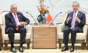 Pakistan's Foreign Minister Ishaq Dar meets Chinese Foreign Minister Wang Yi during talks in Shanghai.