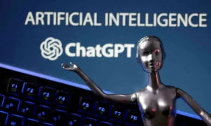 Person using an AI chatbot on a computer while researchers study its impact on cognitive skills.