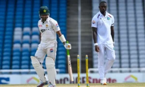 West Indies cricketers celebrate a wicket during their 90-run victory over Pakistan in the first Test match in Trinidad.