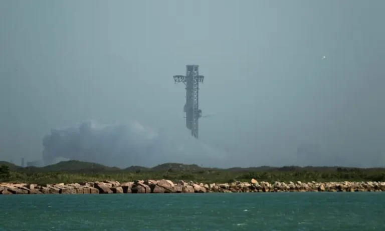 SpaceX Starship rocket on the launch pad after an automatic launch abort caused by engine problems.