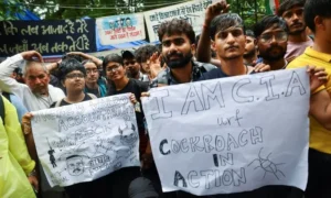 Student protesters gather in New Delhi demanding exam reforms after the NEET paper leak controversy.