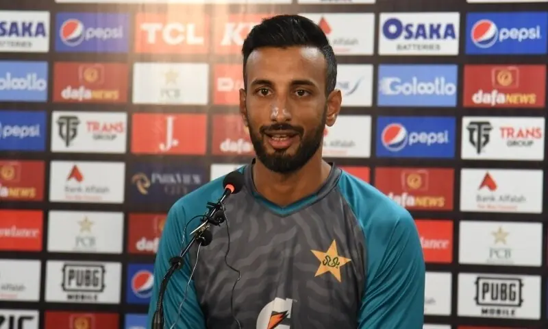 Pakistan captain Shan Masood receives treatment after fracturing his left index finger during the first Test against the West Indies.
