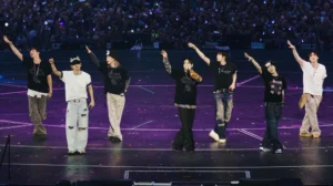 BTS performing live at Tottenham Hotspur Stadium during their London comeback concert in 2026.
